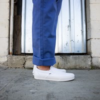 blue and white slip on vans